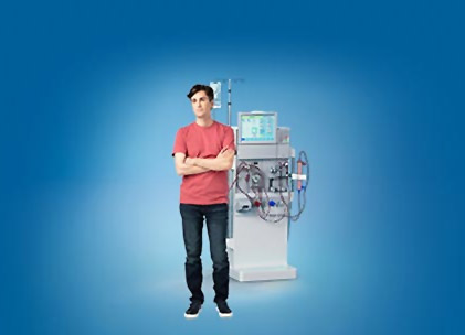 Adult Standing Next To Dialysis Machine